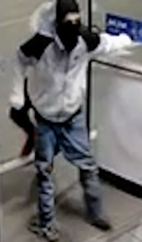 A security camera image shows one of two unidentified burglars who broke into the Howdy's Chevron gas station convenience store on Joe Battle Boulevard at Rojas Drive in far East El Paso in the early hours of May 31, 2026.
