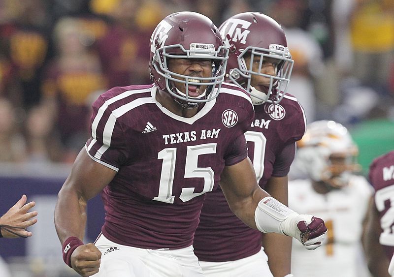 Sep 5, 2015; Houston, TX, USA;  Texas A&M Aggies defensive lineman Myles Garrett (15) celebrates his sack against Arizona State Sun Devils quarterback Mike Bercovici (2) (not pictured)in the first quarter at NRG Stadium. Mandatory Credit: Thomas B. Shea-USA TODAY Sports