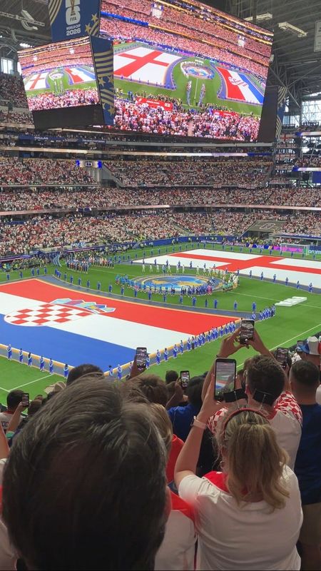 Fans await the national anthems before Croatia's World Cup match with England at AT&T Stadium in Arlington on June 17