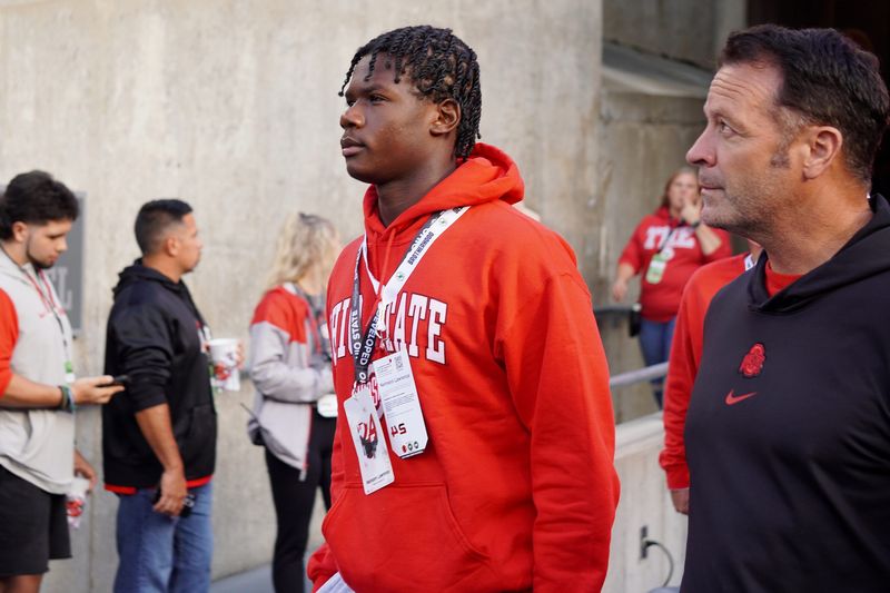 Sept 7, 2024; Columbus, OH, USA; Ransom Everglades quarterback Neimann Lawrence walks into Ohio Stadium before the Buckeyes' 56-0 win over Western Michigan.