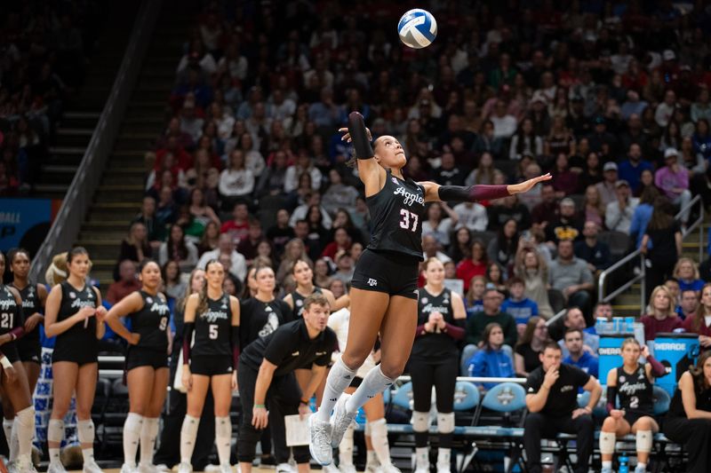 Dec 21, 2025; Kansas City, MO, USA; Texas A&M Aggies outside hitter Kyndal Stowers (37) serves the ball against Kentucky in the second set of the 2025 NCAA Women’s Volleyball Championship at T-Mobile Center.Mandatory Credit: Kylie Graham-Imagn Images