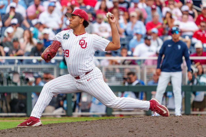 Jun 21, 2026; Omaha, NE, USA; Oklahoma Sooners pitcher Trent Collier (39) pitches against the North Carolina Tar Heels during the ninth inning at Charles Schwab Field. Mandatory Credit: Dylan Widger-Imagn Images