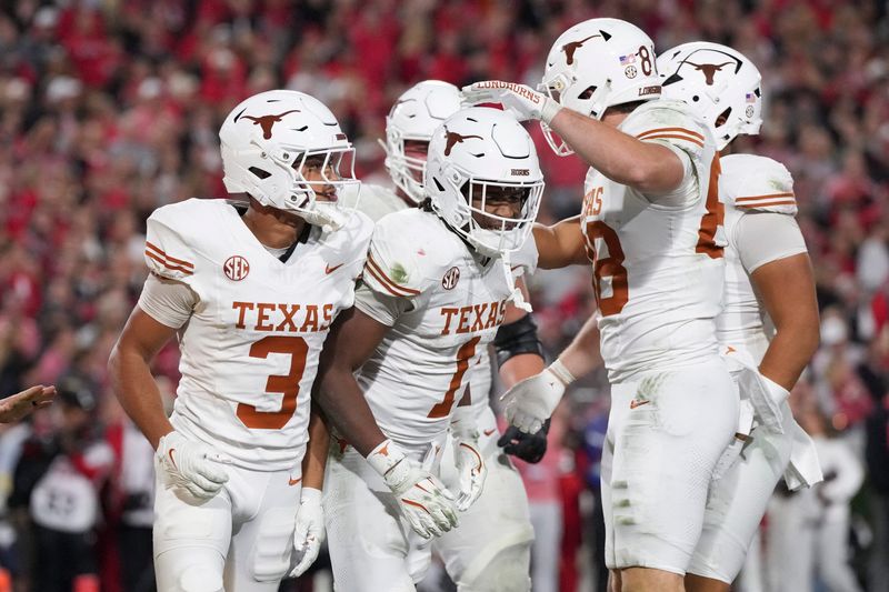 Nov 15, 2025; Athens, Georgia, USA; Texas Longhorns wide receiver Ryan Wingo (1) celebrates scoring a touchdown with teammates in the second half against the Georgia Bulldogs at Sanford Stadium. Mandatory Credit: Dale Zanine-Imagn Images
