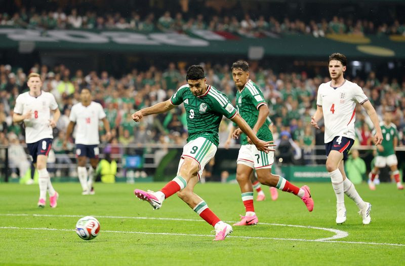 Raul Jimenez #9 of Mexico shoots and misses a chance during the FIFA World Cup 2026 Round of 16 match between Mexico and England at Mexico City Stadium on July 05, 2026 in Mexico City, Mexico.