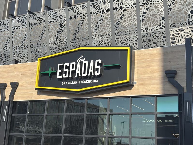 Signage and construction work for Las Espadas Brazilian steakhouse is taking place at the base of the PNC Bank building, at 6044 Gateway Blvd. E.