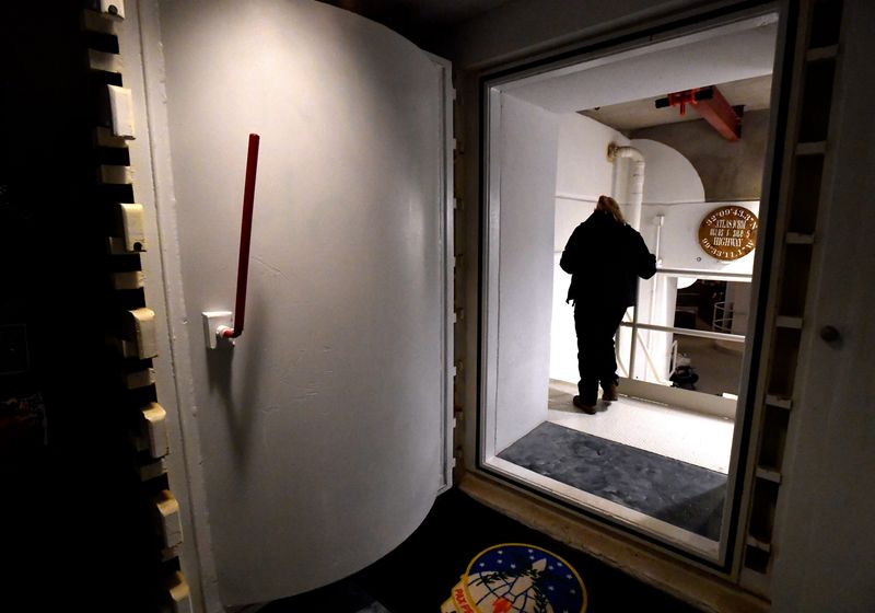 A visitor walks past the heavy blast door leading into the Launch Control Center at the Site 5 Atlas missile silo near Oplin April 18, 2026. Now called the Atlas Missile Museum of Texas, tours are led by appointment.