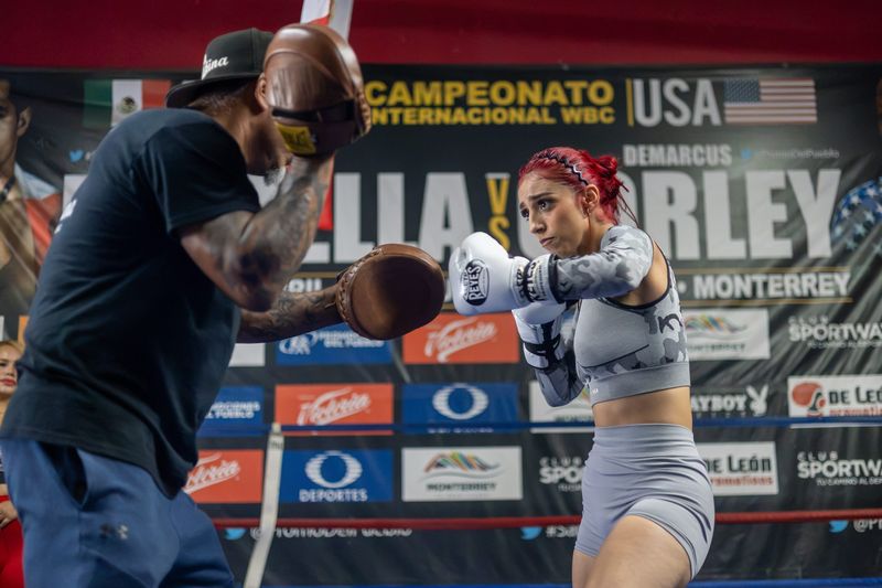 Nayeli Rodriguez works the mitts with her father and trainer, Joe Rodriguez, during the Ring Wars media workout as she prepares for her upcoming bout at Warriors Edge Boxing Gym in El Paso, Texas, on July 15, 2026.