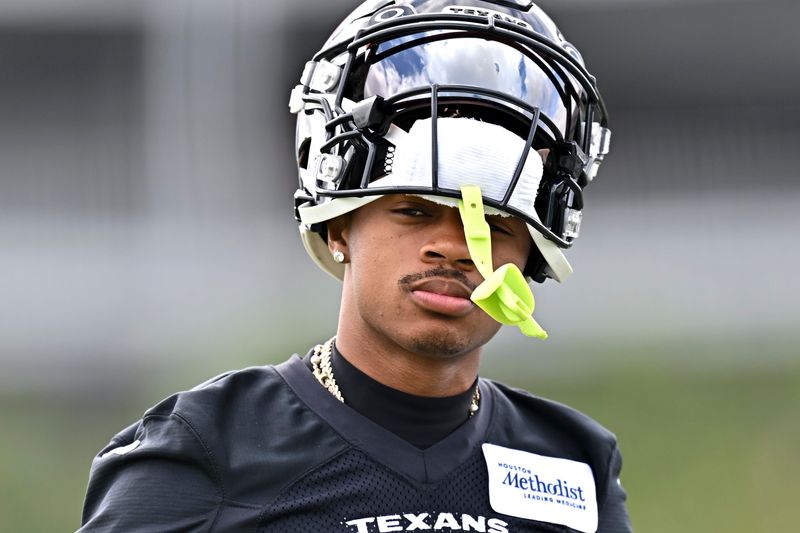 Jun 9, 2026; Houston, Texas, USA; Houston Texans wide receiver Tank Dell arrives for the team’s minicamp at Houston Methodist Training Center. Mandatory Credit: Maria Lysaker-Imagn Images