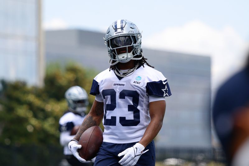 Jun 16, 2026; Dallas, TX, USA;  Dallas Cowboys running back Jaydon Blue (23) goes through a drill during practice at the Ford Center at the Star Training Facility in Frisco, Texas. Mandatory Credit: Chris Jones-Imagn Images