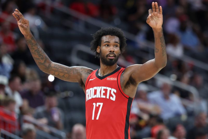 Apr 12, 2026; Houston, Texas, USA; Houston Rockets forward Tari Eason (17) reacts after a play during the third quarter against the Memphis Grizzlies at Toyota Center. Mandatory Credit: Troy Taormina-Imagn Images
