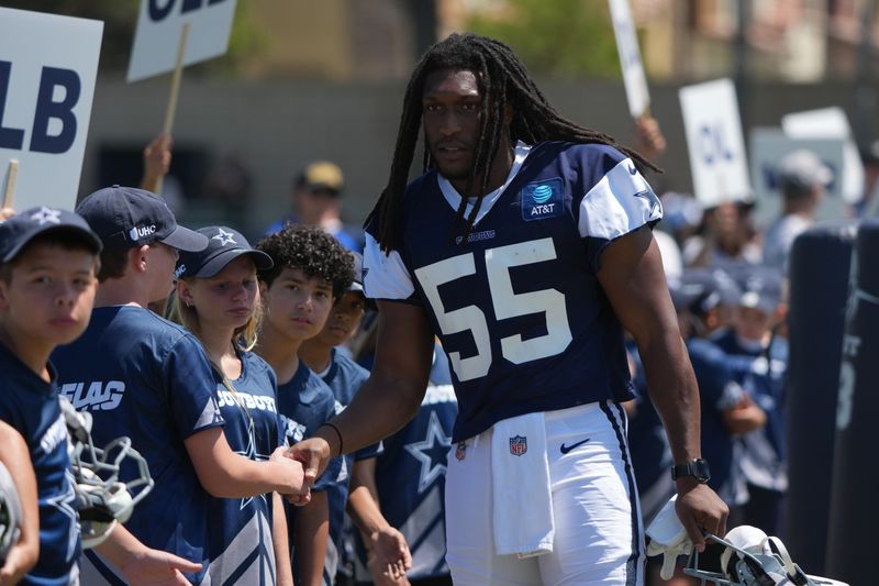 Aug 1, 2026; Oxnard, CA, USA; Dallas Cowboys linebacker Jaishawn Barham (55) greets fans at training camp at River Ridge Playing Fields. Mandatory Credit: Kirby Lee-Imagn Images
