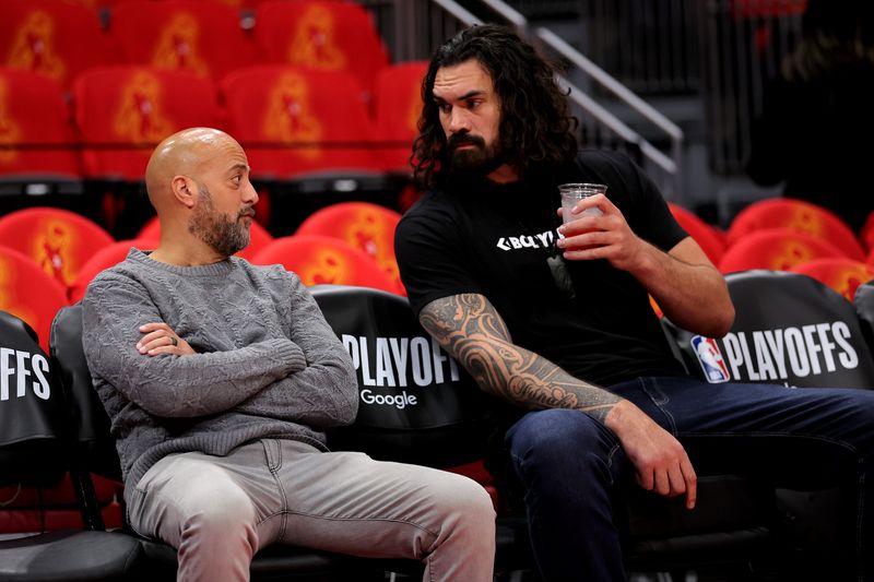 May 1, 2026; Houston, Texas, USA; Houston Rockets general manager Rafael Stone talks with Houston Rockets center Steven Adams (12, right) prior to game six of the first round of the 2026 NBA Playoffs against the Los Angeles Lakers at Toyota Center. Mandatory Credit: Erik Williams-Imagn Images