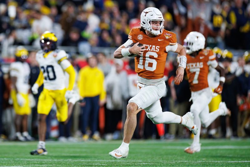 Dec 31, 2025; Orlando, FL, USA; Texas Longhorns quarterback Arch Manning (16) rushes with the ball for a touchdown against the Michigan Wolverines during the second half at Camping World Stadium. Mandatory Credit: Matt Pendleton-Imagn Images