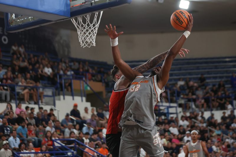 UTEP's #34 battles for the ball during the Borderland friendly basketball game between the Indios de Juárez and the UTEP Miners on Tuesday, August 4, 2026, at the University Gymnasium in Ciudad Juárez. UTEP won 118–78.