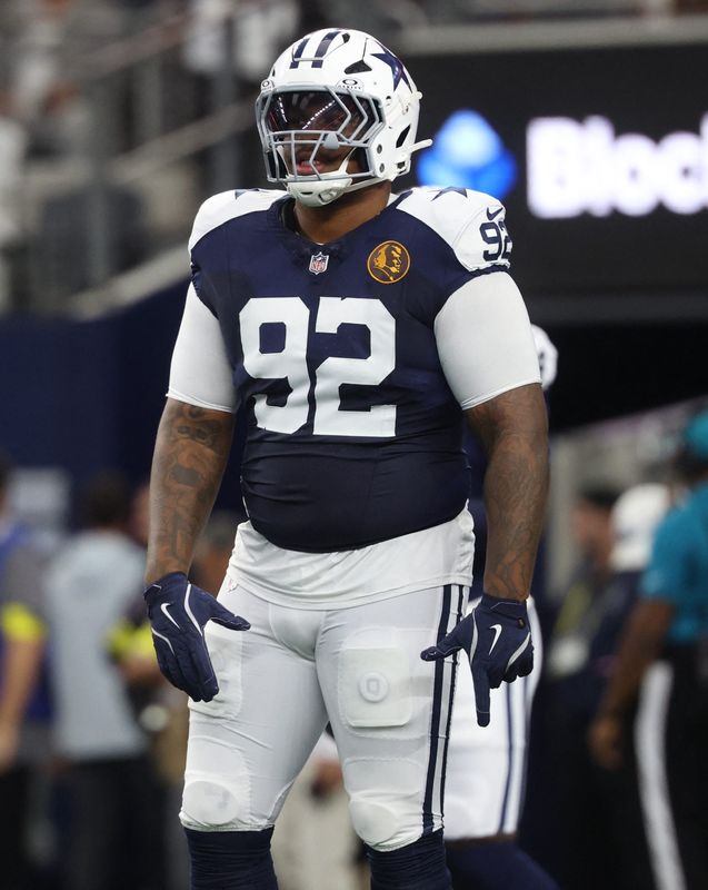 Nov 27, 2025; Arlington, Texas, USA; Dallas Cowboys defensive tackle Quinnen Williams (92) warms up prior to the game against the Kansas City Chiefs at AT&T Stadium. Mandatory Credit: Kevin Jairaj-Imagn Images
