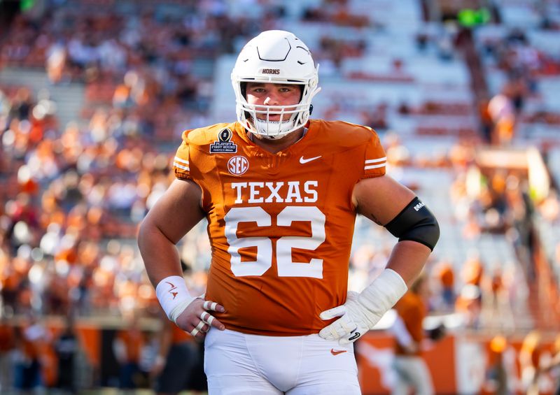 Dec 21, 2024; Austin, Texas, USA; Texas Longhorns offensive lineman Connor Robertson (62) against the Clemson Tigers during the CFP National playoff first round at Darrell K Royal-Texas Memorial Stadium. Mandatory Credit: Mark J. Rebilas-Imagn Images