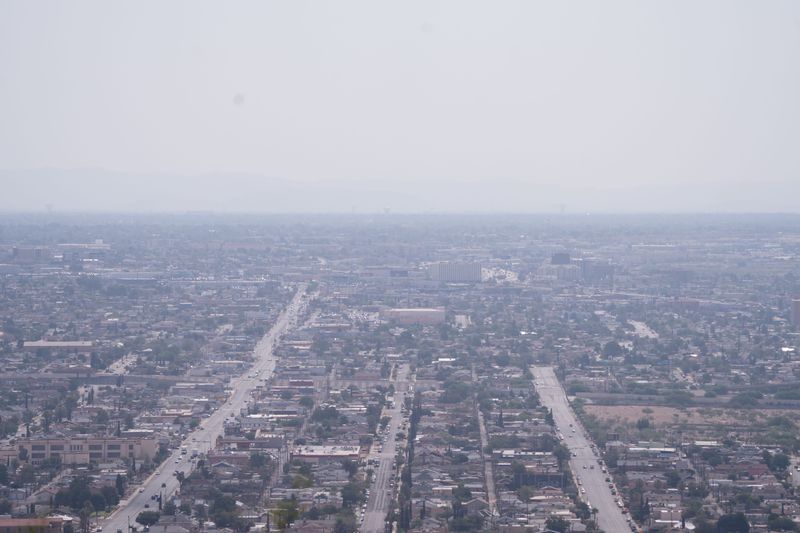 Smoke from distant wildfires hangs over central and East El Paso as seen from Scenic Drive on Thursday, Aug. 6, 2026.