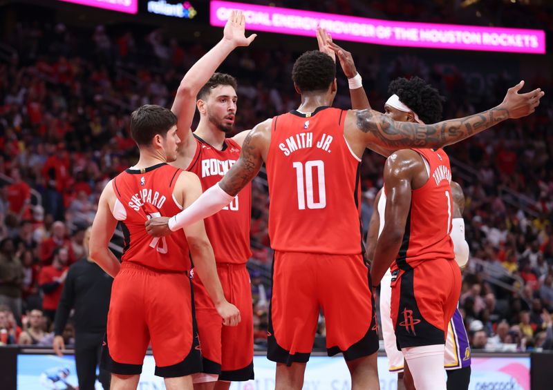 Apr 26, 2026; Houston, Texas, USA; Houston Rockets center Alperen Sengun (28) huddles with teammates during the second quarter against the Los Angeles Lakers during game four of the first round of the 2026 NBA Playoffs at Toyota Center. Mandatory Credit: Troy Taormina-Imagn Images