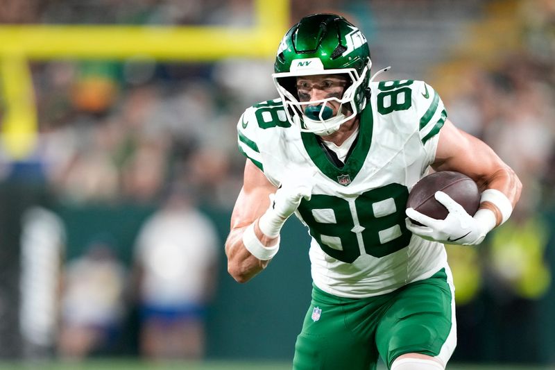 Aug 9, 2025; Green Bay, Wisconsin, USA;  New York Jets tight end Zack Kuntz (88) runs the ball after catching a pass during the second half against the Green Bay Packers at Lambeau Field. Mandatory Credit: Kayla Wolf-Imagn Images