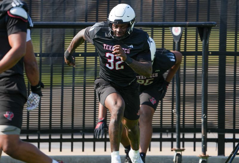 Texas Tech's LaDamion Guyton goes through a drill during football practice, Sunday, Aug. 9, 2026, at the Womble Football Center.