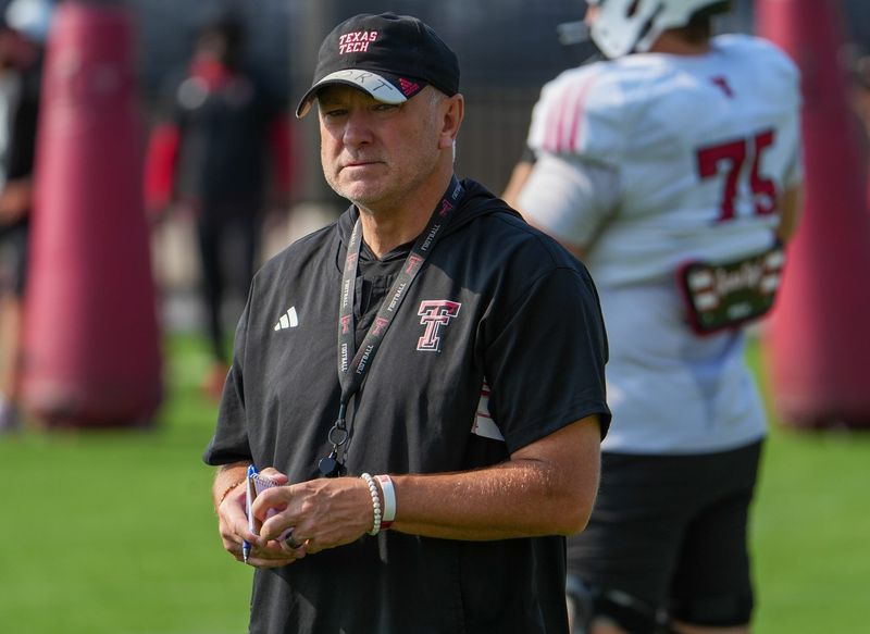 Texas Tech head coach Joey McGuire looks on during football practice, Friday, Aug. 7, 2026, at the Womble Football Center.