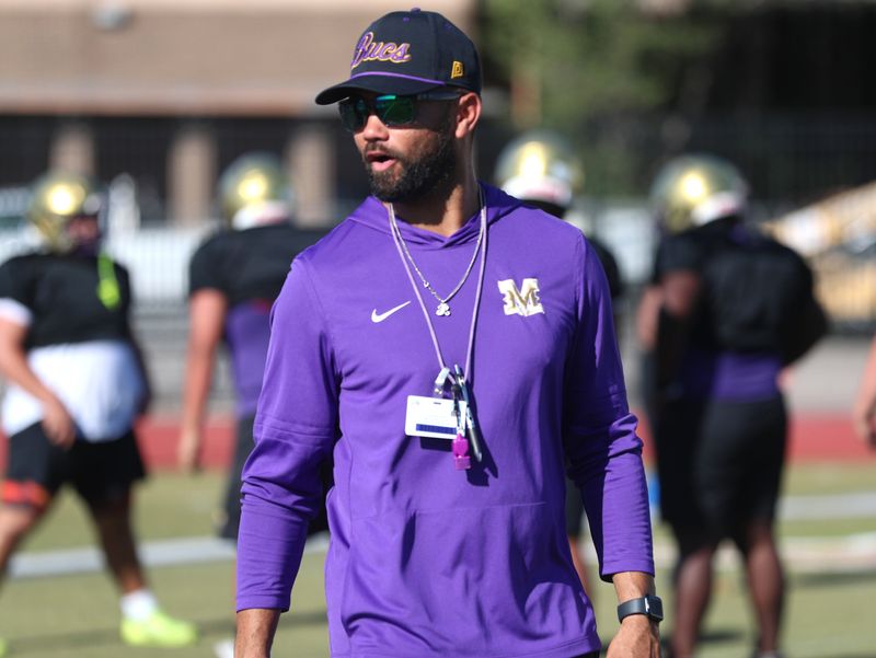 Miller head football coach David McHugh overlooks practice on Tuesday, Aug. 11 2026, at Buccaneer Stadium in Corpus Christi, Texas.