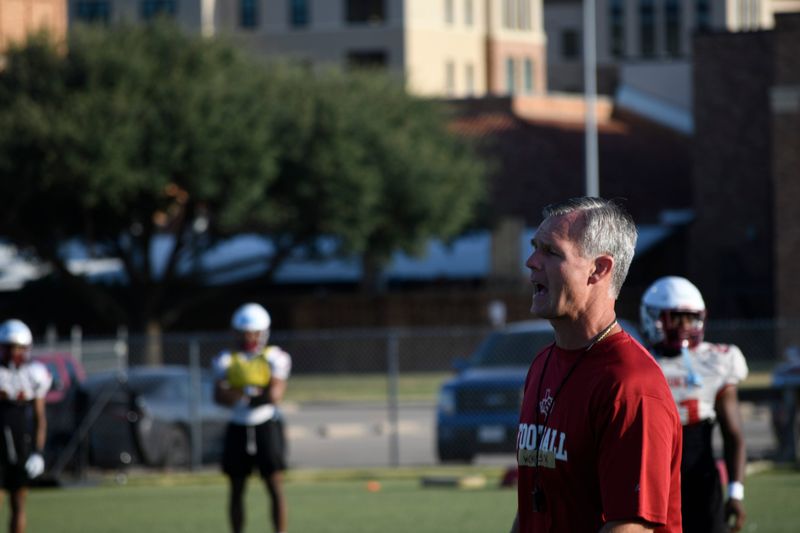 Head coach Rich Renner gives directions on Wednesday, Aug. 12, 2026, at Stang Park.