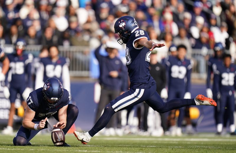 Nov 15, 2025; East Hartford, Connecticut, USA; UConn Huskies kicker Chris Freeman (28) makes the field goal attempt against the Air Force Falcons in the second quarter at Pratt & Whitney Stadium at Rentschler Field. Mandatory Credit: David Butler II-Imagn Images