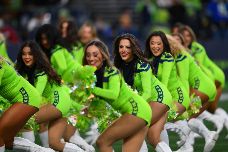 Dec 15, 2024; Seattle, Washington, USA; The Seattle Seahawks cheerleaders perform during the second half of the game between the Seattle Seahawks and the Green Bay Packers at Lumen Field. Mandatory Credit: Steven Bisig-Imagn Images