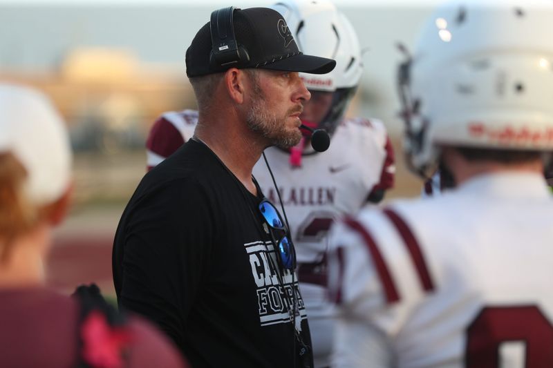 Calallen head football coach Charlie Reeve instructs the Wildcats during Friday's scrimmage against London on Aug. 14, 2026 at Pirate Stadium in Corpus Christi, Texas.