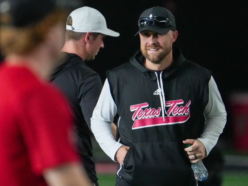 Texas Tech co-defensive coordinator Rob Greene walks the field during football practice, Wednesday, Aug. 5, 2026, at the Womble Football Center.