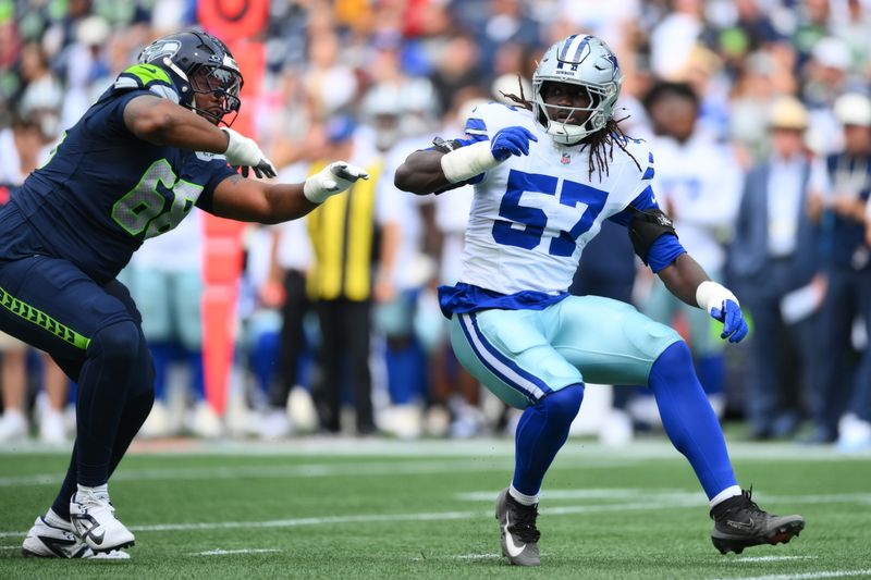 Aug 15, 2026; Seattle, Washington, USA; Dallas Cowboys linebacker Malachi Lawrence (57) during the first half against the Seattle Seahawks at Lumen Field. Mandatory Credit: Steven Bisig-Imagn Images