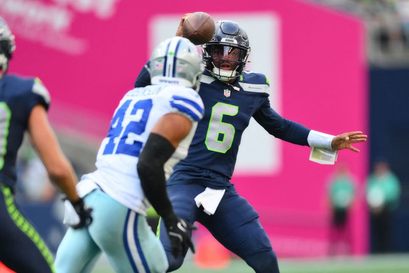 Aug 15, 2026; Seattle, Washington, USA; Seattle Seahawks quarterback Jalen Milroe (6) looks to pass the ball against the Dallas Cowboys during the first half at Lumen Field. Mandatory Credit: Steven Bisig-Imagn Images