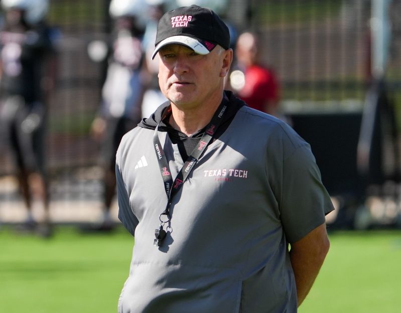 Texas Tech head coach Joey McGuire looks on during football practice, Thursday, Aug. 13, 2026, at the Womble Football Center.