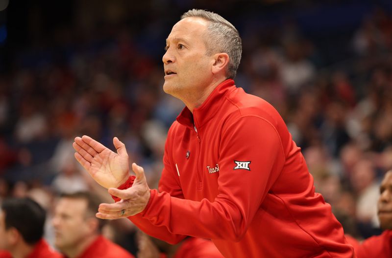 Mar 20, 2026; Tampa, FL, USA; Texas Tech Red Raiders head coach Grant McCasland in the first half against the Akron Zips during a first round game of the men's 2026 NCAA Tournament at Benchmark International Arena. Mandatory Credit: Nathan Ray Seebeck-Imagn Images
