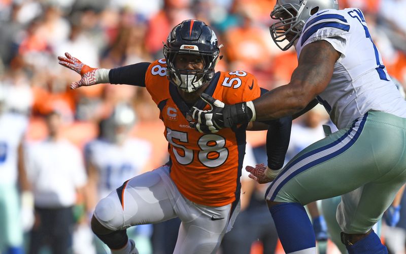 Sep 17, 2017; Denver, CO, USA; Denver Broncos outside linebacker Von Miller (58) passes rushes in the second quarter against the Dallas Cowboys at Sports Authority Field at Mile High. (Ron Chenoy-USA TODAY Sports)