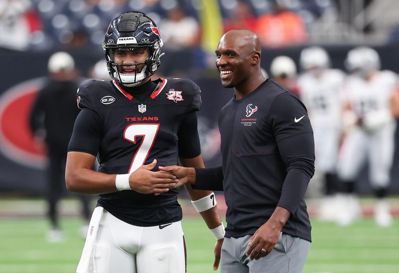 Aug 20, 2026; Houston, Texas, USA;  Houston Texans quarterback C.J. Stroud (7) shakes hands with  head coach DeMeco Ryans before playing agains the Las Vegas Raiders in the first half at Reliant Stadium.  Mandatory Credit: Thomas Shea-Imagn Images