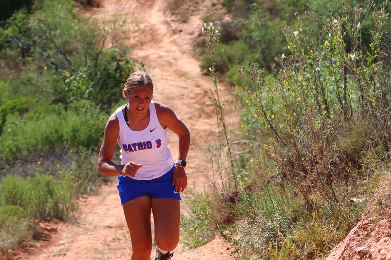 Valley's Hartlee Battey competes in a cross country meet.