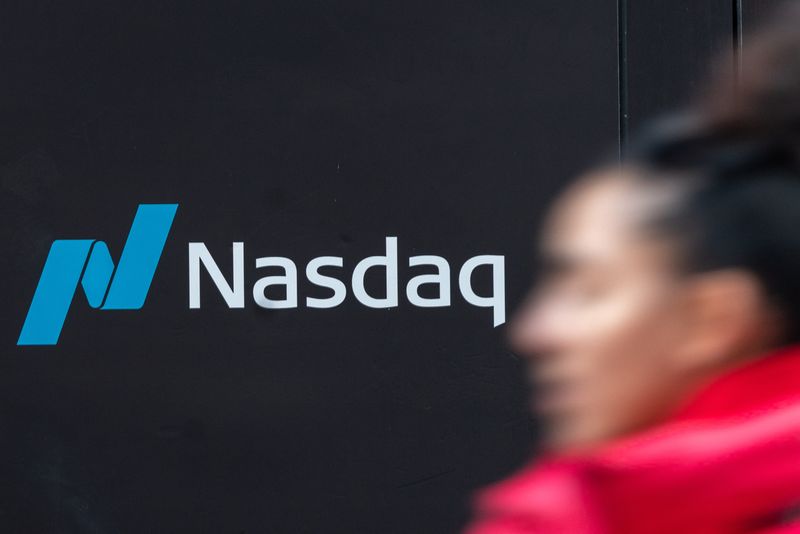 FILE PHOTO: The Nasdaq logo is displayed at the Nasdaq Market site in Times Square in New York City, U.S., December 3, 2021. REUTERS/Jeenah Moon/File Photo