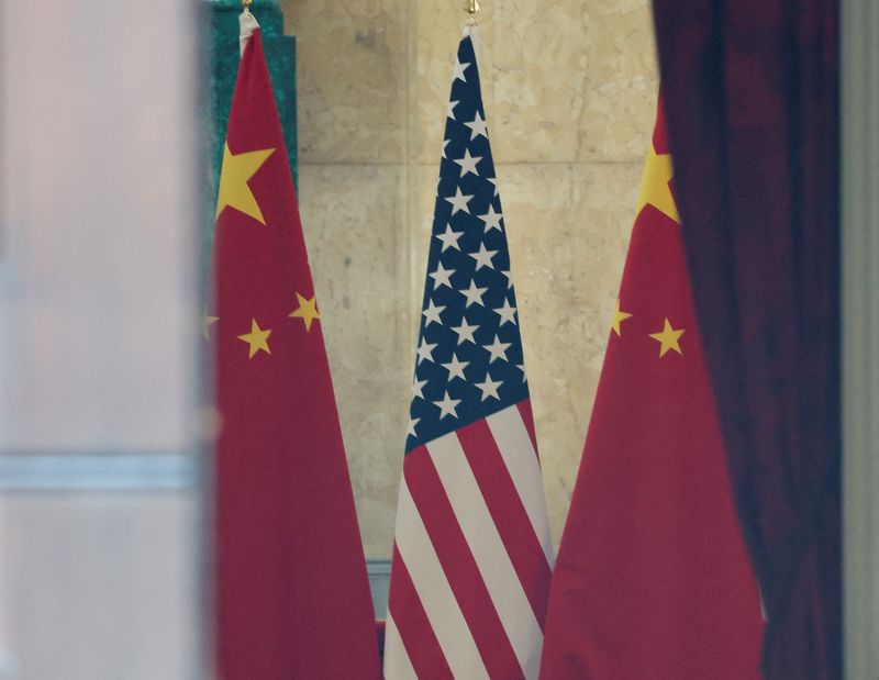 U.S. and China flags are pictured at Lancaster House, on the second day scheduled for trade talks between the U.S. and China, in London, Britain, June 10, 2025. REUTERS/Toby Melville