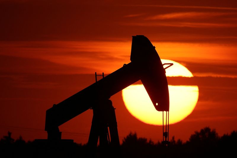 FILE PHOTO: An oil pump of IPC Petroleum France is seen at sunset outside Soudron, near Reims, France, August 24, 2022. REUTERS/Pascal Rossignol/File Photo