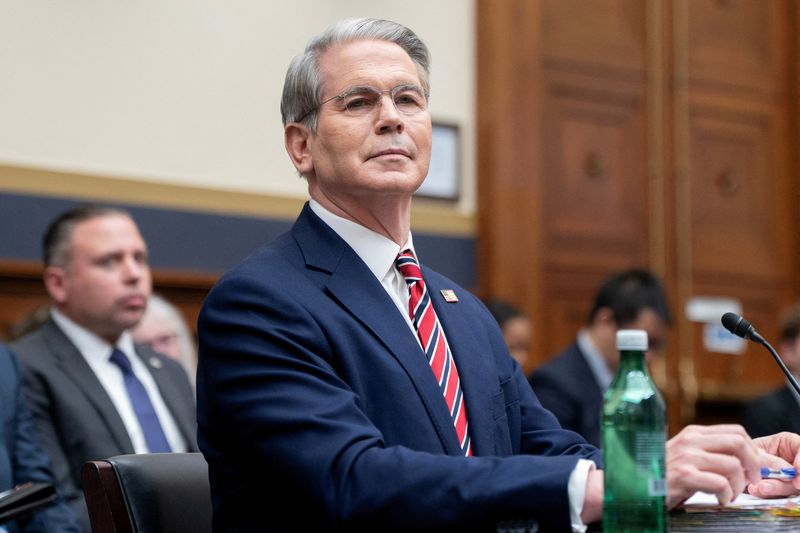 FILE PHOTO: U.S. Treasury Secretary Scott Bessent testifies before a House Financial Services Committee hearing entitled "The Annual Testimony of the Secretary of the Treasury on the State of the International Financial System," on Capitol Hill in Washington, D.C., U.S., May 7, 2025. REUTERS/Nathan Howard/File Photo
