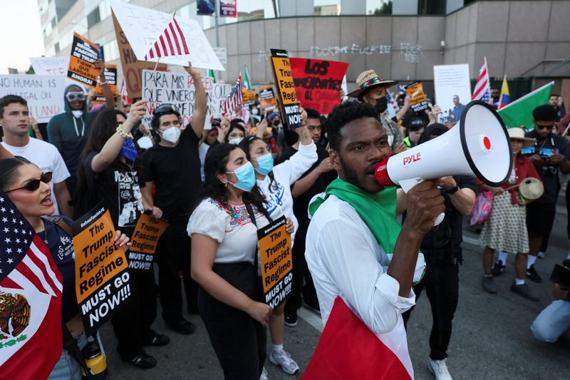 SENSITIVE MATERIAL. THIS IMAGE MAY OFFEND OR DISTURB    Demonstraters take part in a protest against federal immigration sweeps, in Los Angeles, California, U.S., June 12, 2025. REUTERS/Leah Millis