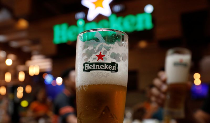 FILE PHOTO: Glasses of Heineken beer are seen at a restaurant in Hanoi, Vietnam May 30, 2019. Picture taken May 30, 2019. REUTERS/Kham/File Photo