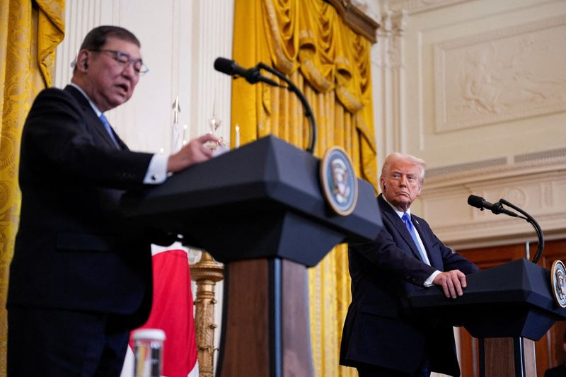 FILE PHOTO: U.S. President Donald Trump holds a joint press conference with Japanese Prime Minister Shigeru Ishiba in the East Room at the White House in Washington, U.S., February 7, 2025. REUTERS/Kent Nishimura/File Photo
