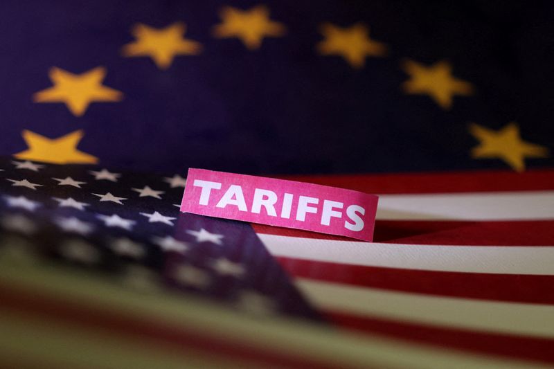 FILE PHOTO: U.S. and European Union flags and a "tariffs" label are seen in this illustration taken April 10, 2025. REUTERS/Dado Ruvic/Illustration/File Photo