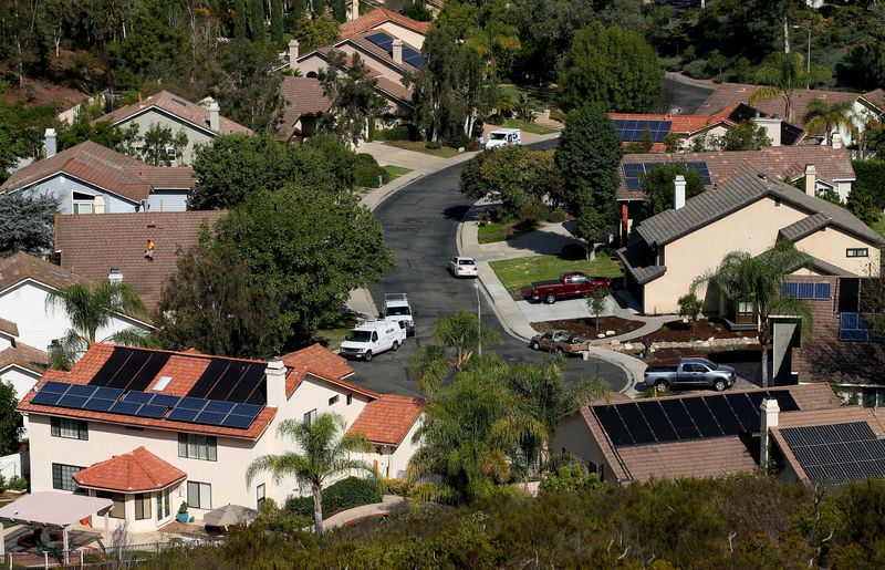 FILE PHOTO: Multiple homes with solar panels are shown in Scripps Ranch, San Diego, California, U.S. October 5, 2016.  REUTERS/Mike Blake/File Photo
