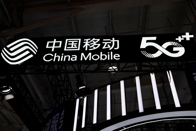 A sign for China Mobile is pictured during the 2022 China International Fair for Trade in Services (CIFTIS) in Beijing, China September 1, 2022. REUTERS/Tingshu Wang/File Photo