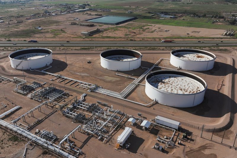 FILE PHOTO: A drone view shows a portion of the crude oil tank farm in Midland, Texas, U.S. June 11, 2025.  REUTERS/Eli Hartman/ File Photo