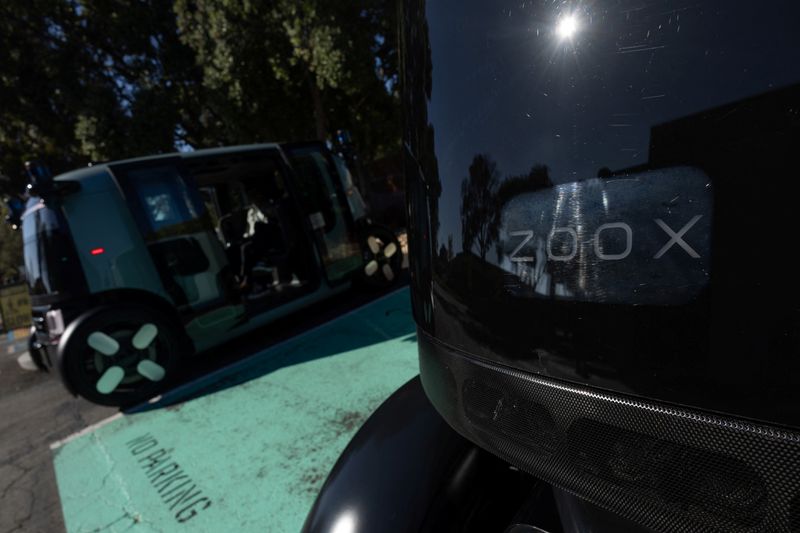 FILE PHOTO: Zoox, a self-driving vehicle owned by Amazon, is seen at the company's Headquarters during a test drive in Foster City, California, U.S. October 15, 2024. REUTERS/Carlos Barria/ File Photo